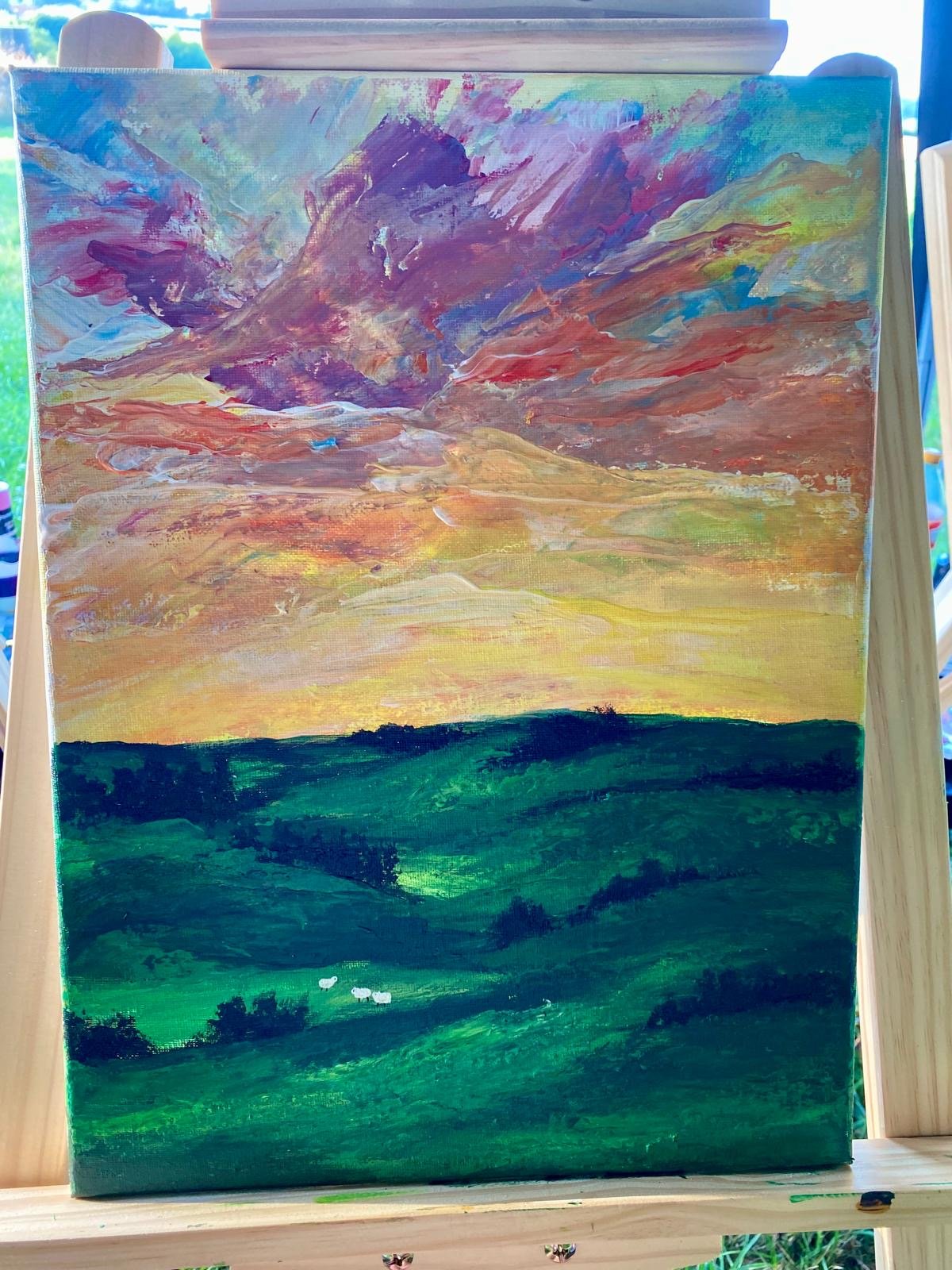 Fertiges Bild — Sonnenuntergang über Hügeln